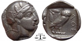 Attica, Athens AR Tetradrachm 440-430 BC. Helmeted head of Athena right / AΘE, owl standing right; olive-sprig and crescent above. Delepierre1446. 25 ...