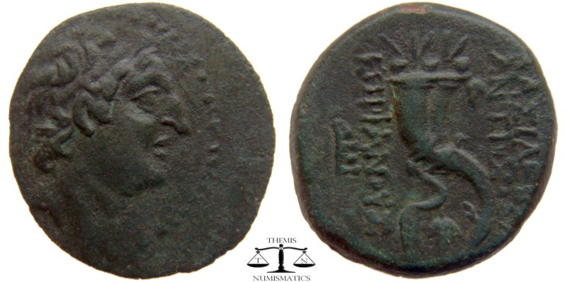 Antiochos VIII Seleucia, AE23 Antioch 121-96 BC. Diademed head right, within dot...