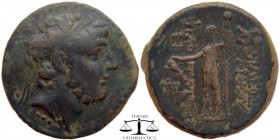 Antiochos IX Philopator Seleucia, AE25 Tarsos 114-95 BC. Diademed head right / BAΣIΛEΩΣ ANTIOXOY ΦIΛOΠATOΡOΣ, Dionysos, wearing short chiton and boots...