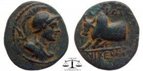 Caria, AE15 Stratonikeia ca 2nd cent BC. Helmeted bust of Athena right, holding transverse spear / ΣTΡATO-NIKEΩN above and below forepart of Zebu bull...