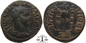 Valerian Pisidia, AE23 Antioch 253-260 AD. IMP CAE P AELL OVALERIAN, radiate, draped and cuirassed bust right / ANTIOC-HIO CL, vexillum surmounted by ...