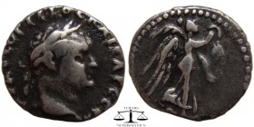 Titus Cappadocia, Caesarea AR Hemidrachm 79-81 AD. AYTOKPATΩP TITO KAICAΡ CEBA, laureate head right / Victory advancing right bearing wreath and palm....