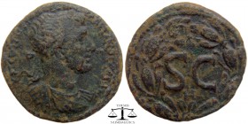 Hadrian Syria, AE28 Antioch 117-138 AD. AVT KAIC Θ TP Π YI Θ NEP YIW TP ADPIANOC CEBAC, laureate, draped and cuirassed bust right / large SC, small H ...