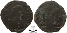 Justin I AE Follis Vandals 518-527 AD. +N IVSTI-NVS PP A, pearl diademed, draped, cuirassed bust right / Large M, star to left, cross above, star to r...