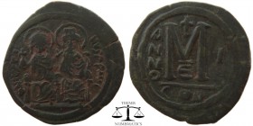 Justin II & Sophia AE Follis Constantinople 565 AD. DN IVSTI-NVS PP AVG, Justin on left holding cross on globe and Sophia on right, holding sceptre to...