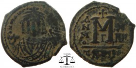 Maurice Tiberius AE Follis Antioch 582-602 AD. blundered legend, bust facing, wearing crown with trefoil ornament, and consular robes; in right hand, ...