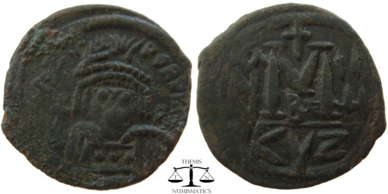 Heraclius AE Follis Cyzicus 610-641 AD. blundered or fragmentary legend, helmete...