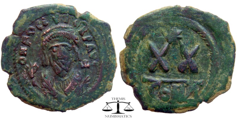 Phocas AE Half Follis Constantinople 602-610 AD. DN FOCA PERP AVG, crowned and m...