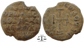 Seal in the name of Theodore, PB19 ca. 9th-10th century AD. A patriarchal cross mounted on a base of three steps, Κύριε βοήθει τῷ σῷ δούλῳ / Legend in...