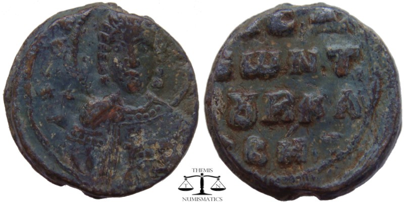 Seal in the name of ?, PB Iconographic 11th? century AD. Facing bust of St. Thek...