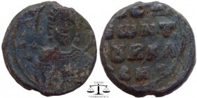Seal in the name of ?, PB Iconographic 11th? century AD. Facing bust of St. Thekla, wearing chiton and maphorion, holding book of Gospels in right han...