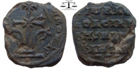 Seal in the name of ?, PB ca. 9th-10th? century AD. A patriarchal cross with fleurons mounted on a base of one step, Κύριε βοήθει τῷ σῷ δούλῳ / legend...