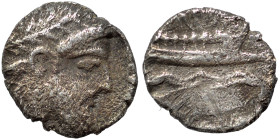 PHOENICIA. Arados. Uncertain king. Circa 400-384 BC. 1/16 Shekel (silver, 0.74 g, 9 mm). Laureate head of Ba'al-Arwad right. Rev. Galley right, above ...