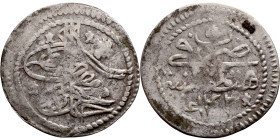 Ottoman Empire (XIV-XX century) Silver Coin. Obverse: Arabic inscription. Reverse: Arabic inscription

16mm 0.58g