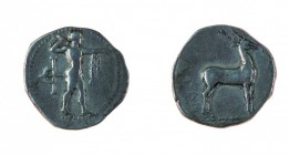 Bruttium 
Caulonia - Statere databile al periodo 400-388 a.C. - Diritto: Apollo in cammino verso destra tiene un ramo con la mano destra alzata e il ...