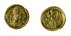 Teodosio II (408-450 d.C.) 
Solido databile al periodo 408-420 d.C. - Zecca: Costantinopoli - Diritto: mezzo busto elmato e diademato dell’Imperatore...