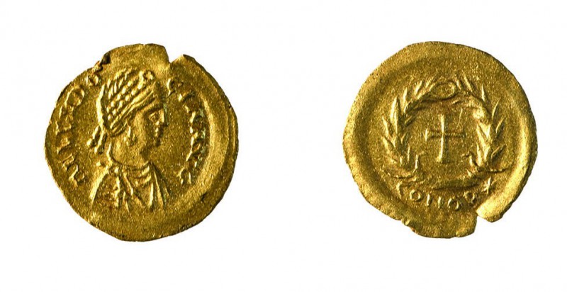 Teodosio II (408-450 d.C.) 
Tremisse al nome e con l’effigie di Eudocia, moglie...