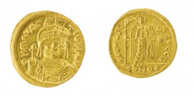 Monete Bizantine 
Maurizio Tiberio (582-602) - Solido databile al periodo 583-601 - Zecca: Costantinopoli - Diritto: mezzo busto elmato e diademato d...