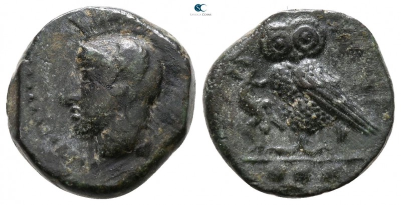 Sicily. Kamarina circa 420-405 BC. 
Tetras or Trionkion Æ

14 mm., 2.67 g.
...