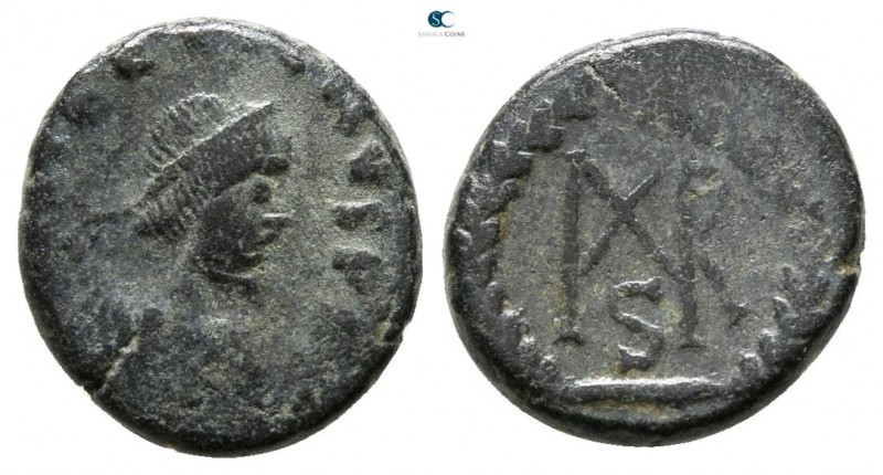 Marcian AD 450-457. Nicomedia
Nummus Æ

11 mm., 1.21 g.



nearly very fi...