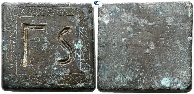 circa AD 400-600. 
Uniface square weight of 6 Ounkia Æ

41 mm., 157.91 g.

...