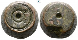 circa AD 500-700. Barrel-shaped weight of 1 Ounkia Æ
