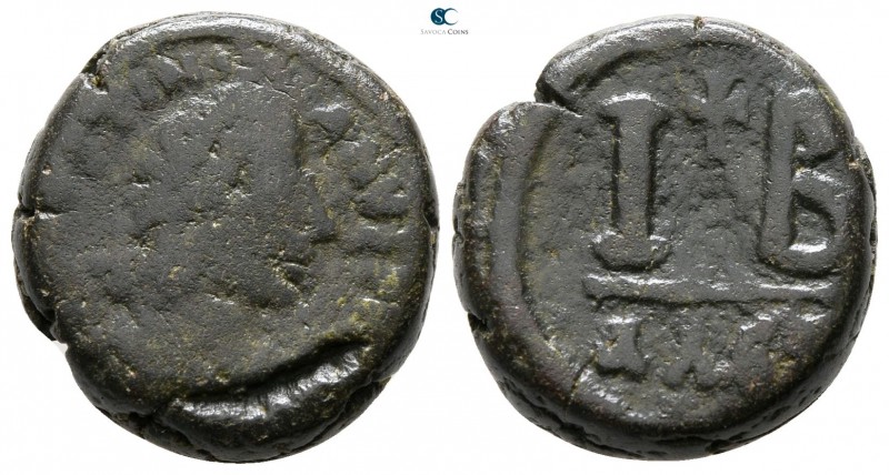 Justinian I. AD 527-565. Alexandria
12 Nummi Æ

16 mm., 5.32 g.



fine