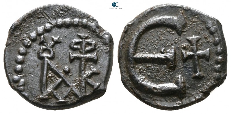 Justinian I. AD 527-565. Constantinople
Pentanummium Æ

14 mm., 1.46 g.


...