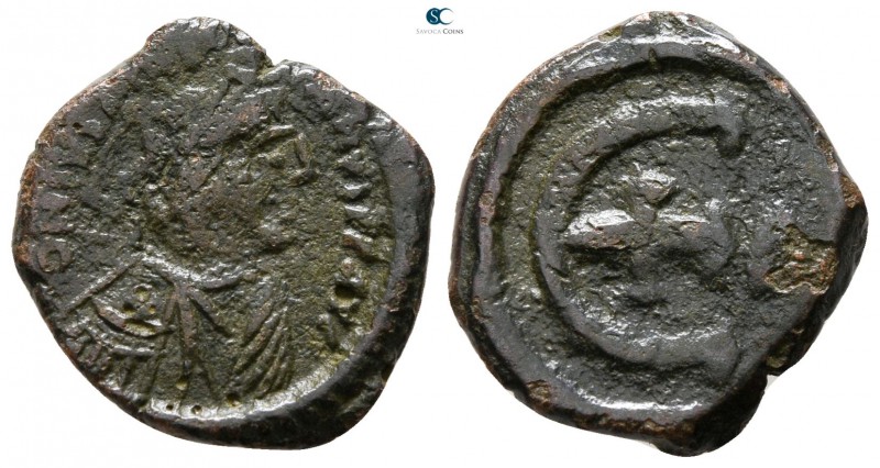 Justinian I. AD 527-565. Theoupolis (Antioch)
Pentanummium Æ

16 mm., 2.39 g....