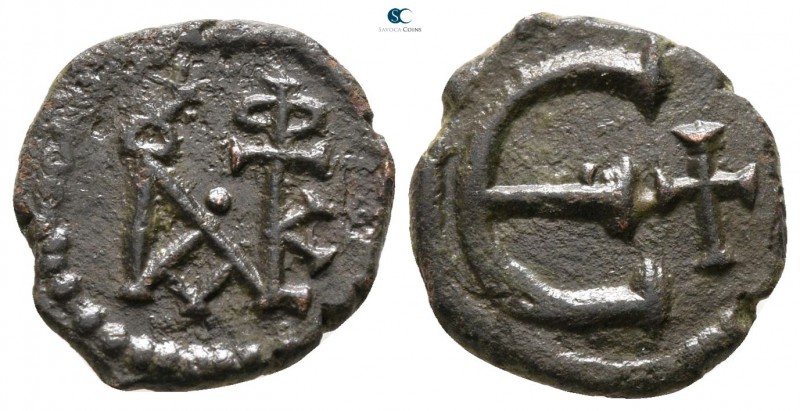 Justin II AD 565-578. Constantinople
Pentanummium Æ

13 mm., 1.66 g.



v...