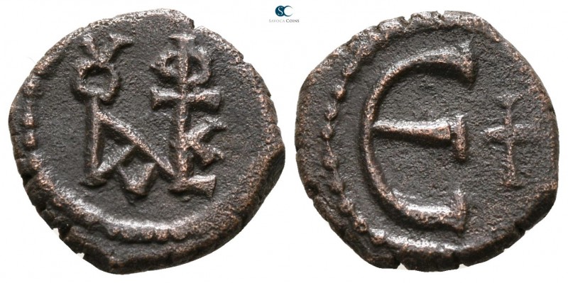 Justin II AD 565-578. Constantinople
Pentanummium Æ

14 mm., 1.90 g.



v...