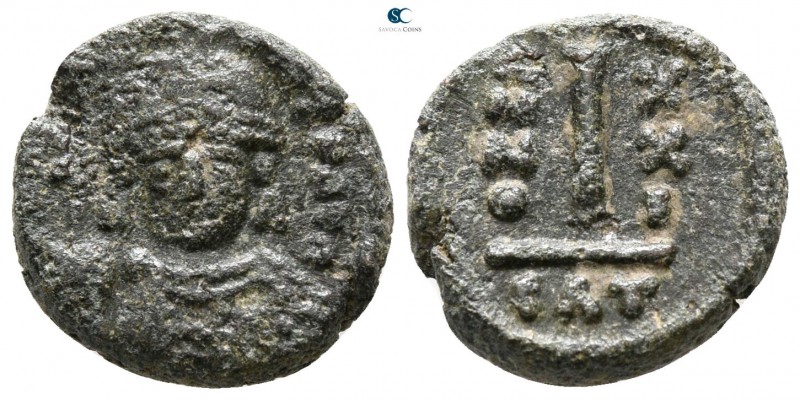 Maurice Tiberius AD 582-602. Catania
Decanummium Æ

14 mm., 2.55 g.



ne...
