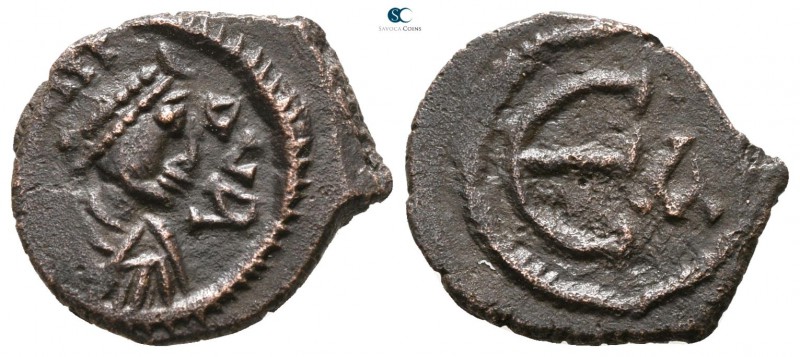 Maurice Tiberius AD 582-602. Constantinople
Pentanummium Æ

13 mm., 1.59 g.
...