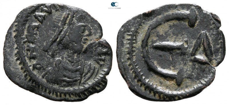 Maurice Tiberius AD 582-602. Constantinople
Pentanummium Æ

16 mm., 0.79 g.
...