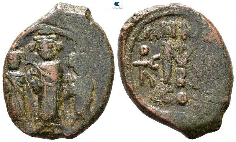 Heraclius & H.Constantine & Martina AD 610-641. Constantinople
Follis Æ

25 m...