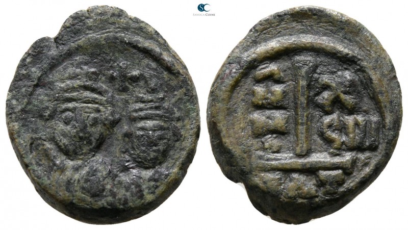 Heraclius with Heraclius Constantine AD 610-641. Catania
Decanummium Æ

17 mm...