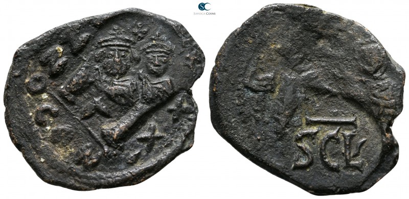Heraclius with Heraclius Constantine AD 610-641. Sicilian mint
Follis Æ

27 m...