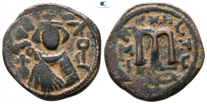 Umayyad Caliphate circa AD 670-690. Hims (Emesa) mint
Fals (Follis) Æ

19 mm....