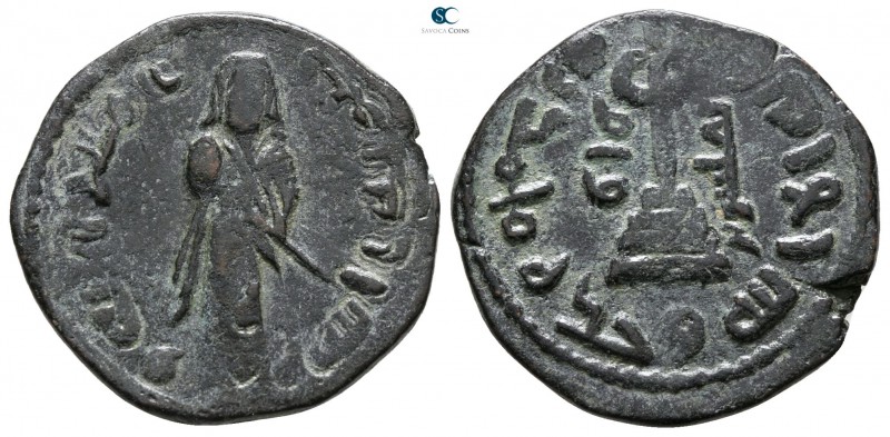 Umayyad Caliphate circa AD 685-705. 
Fals Æ

20 mm., 2.87 g.



very fine...