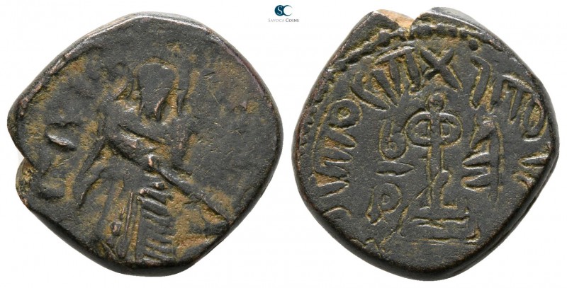 Umayyad Caliphate circa AD 685-705. 
Fals (Follis) Æ

16 mm., 3.93 g.



...