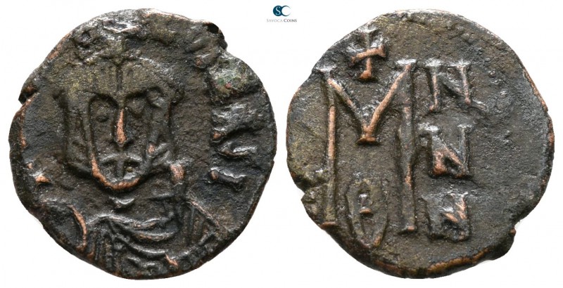 Theophilus AD 829-842. Syracuse
Follis Æ

15 mm., 1.20 g.



very fine