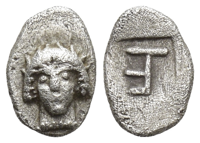 IONIA. Kolophon. (Circa 450-410 BC). AR Tetartemorion. (0.2 Gr. 7mm )
Facing hea...