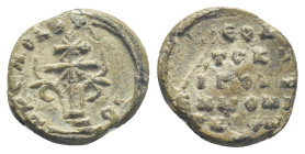 Byzantine Lead Seal (16mm, 3.3 g). Patriarchal cross on steps with floral ornaments springing from base. Rev: Legends in three lines.