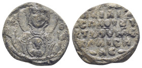 Byzantine Lead Seal, (19mm, 6.3 g) Nimbate facing bust of the Virgin Mary, orans, with small medallion of young Jesus Christ over her breast./ Legends...