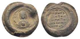 Byzantine Lead Seal, (19mm, 8.1 g) MHP - ΘY Facing half length bust of the Virgin Mary, orans, wearing chiton and maphorion; in front of her, facing b...