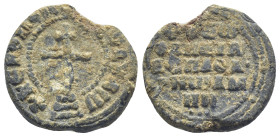 Byzantine Lead Seal, (19mm, 8.1 g) Patriarchal cross set upon step. / Legends in five lines.