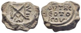 Byzantine Lead Seal, (23mm, 12.4 g) cruciform monogram;. / Legends in three lines.