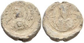 *John Doukas, Caesar, eleventh century, second half
Av.: Bust of the Mother of God, nimbate, holding before her the medallion of the Christ child.   ...