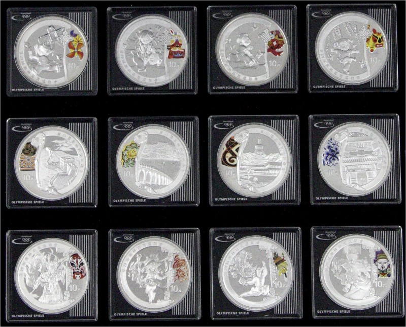 China
Lots der Volksrepublik China
Sammelschatulle mit 13 X 10 Yuan Silber zur...