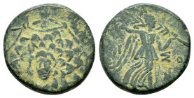 PONTOS.Amisos.(Circa 105-63 BC).Ae.

Obv : Aegis with Gorgon's head at center.

Rev : AΜΙΣΟΥ.
Nike advancing right, holding wreath and palm branch, be...
